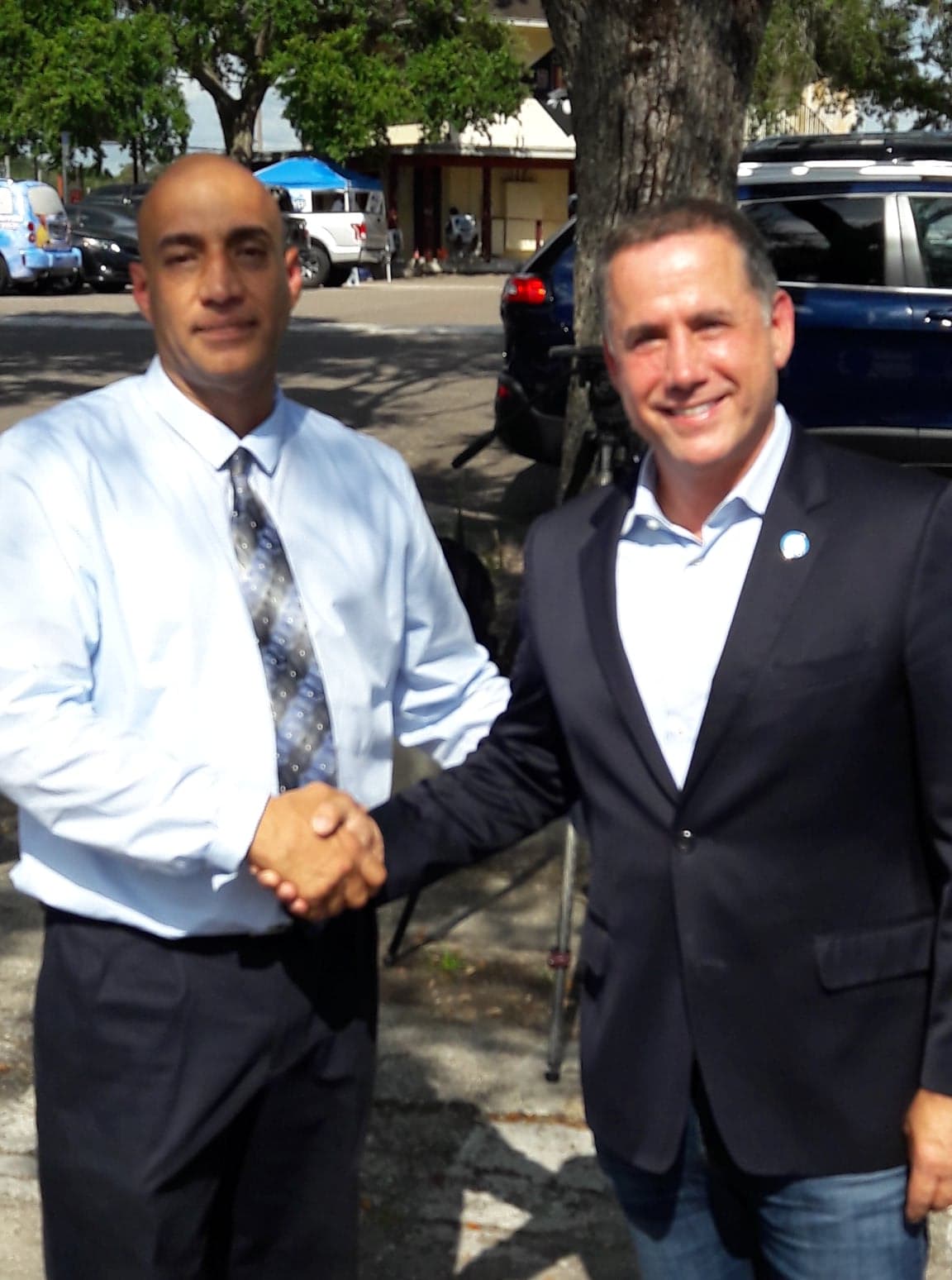 Robert Merced with the former Mayor of Miami Philip Levine