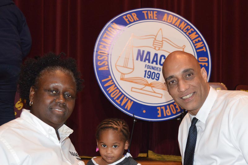 Robert Merced with the president of the Hillsborough branch of the NAACP Yvette Lewis.